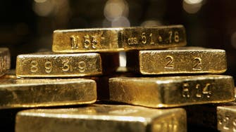 Gold slides below $1,150 as dollar strengthens