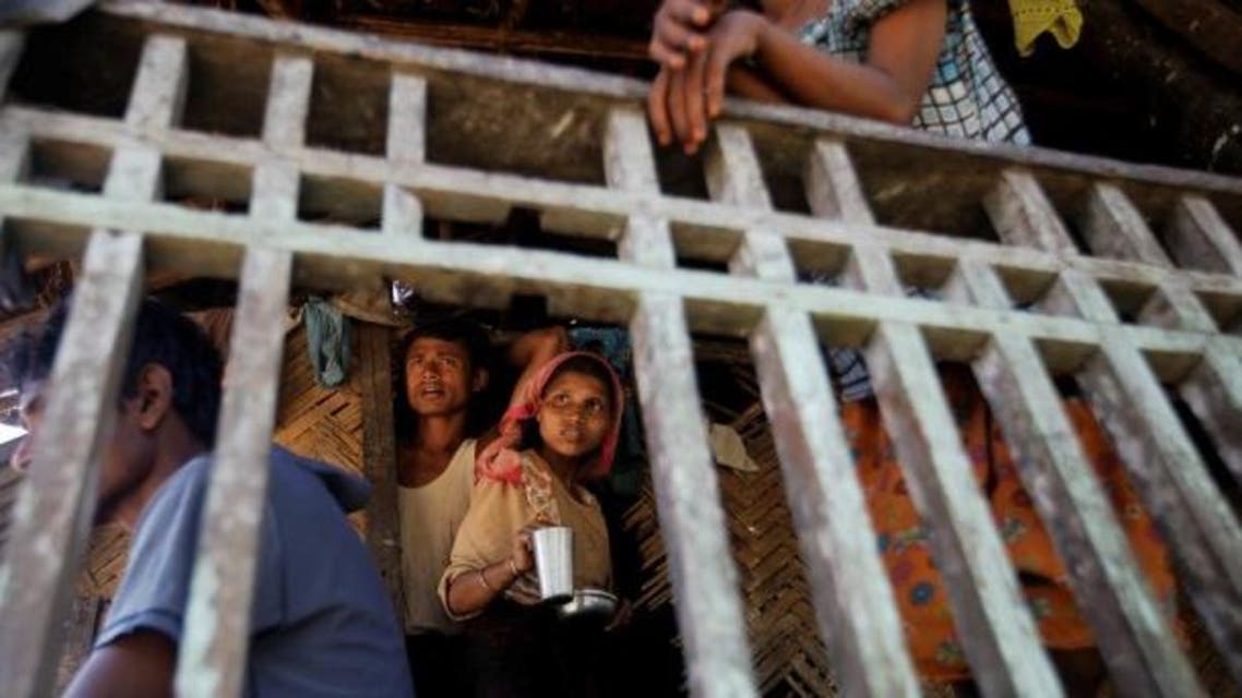 Muslims pass the time at their house in Paik Thay, the site of violence between Muslim Rohingyas and Arakanese Buddhists. (File Photo: Reuters)