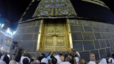 Muslim pilgrims gather around the door of the Kaaba at the Grand Mosque on the first day of Eid al-Adha in the holy city of Mecca October 4, 2014. (Reuters)