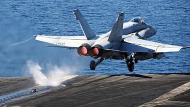 An F/A-18C Hornet assigned to the Golden Warriors of Strike Fighter Squadron (VFA) 87 takes off from the flight deck of the aircraft carrier USS George H.W. Bush (CVN 77) strike operations in Iraq and Syria (U.S. Navy photo)