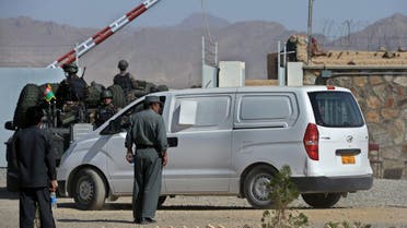   Afghan security forces escort a van allegedly transporting Afghan men to be executed, at Pul-e-Charkhi prison, on the outskirts of Kabul on October 8, 2014. (AFP)
