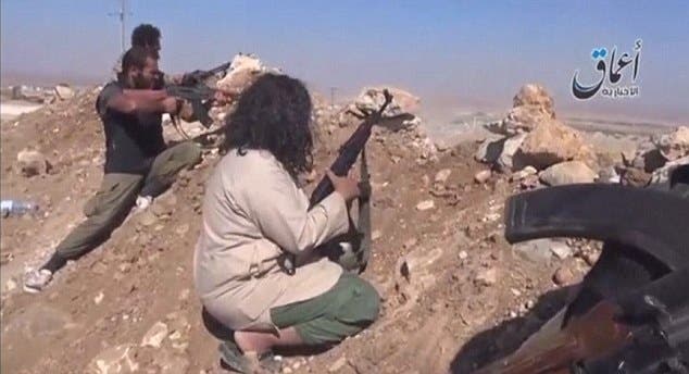 نساء وأطفال يقاتلون دفاعاً عن كوباني