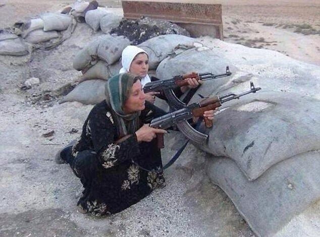 نساء وأطفال يقاتلون دفاعاً عن كوباني