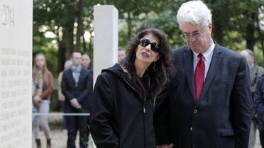  US journalist James Foley's parents stand in the war reporters' memorial after the unveiling of a stone in honor of the war reporters killed in 2014. (AFP)