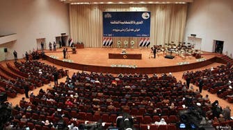 To stem extremists, Iraq to reduce Baghdad’s power