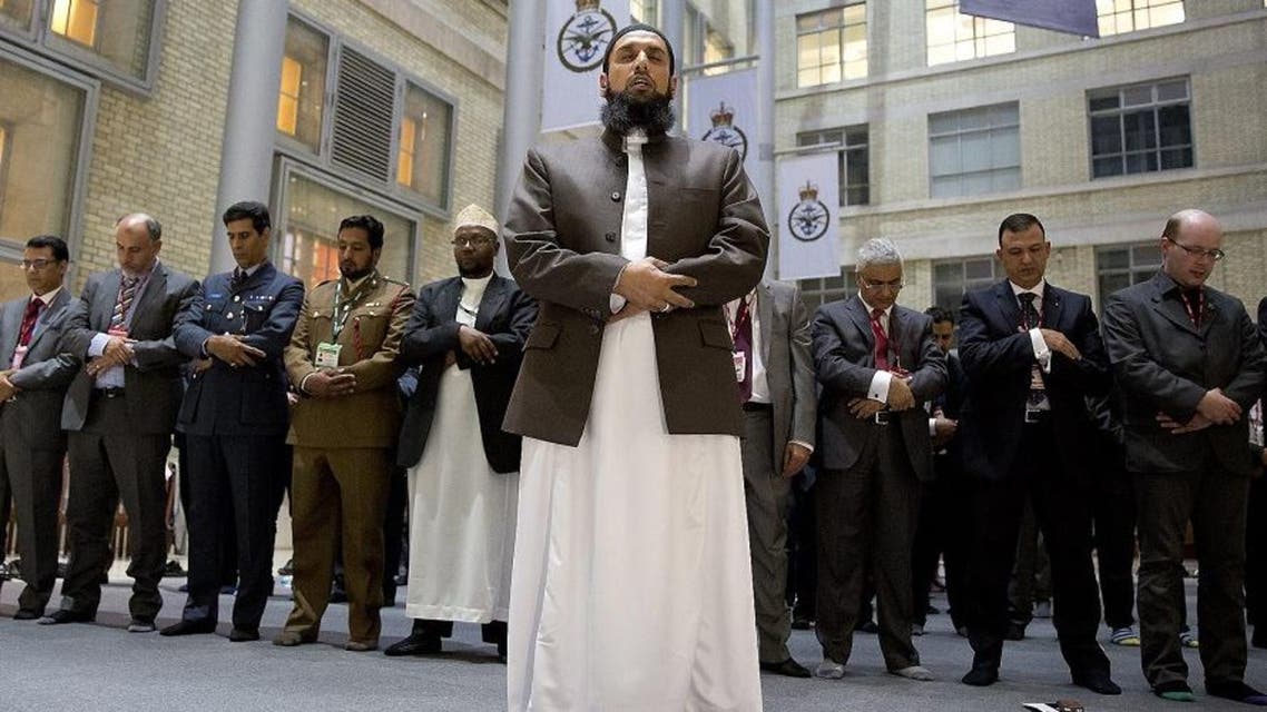 Imam Asim Hafiz, OBE the Islamic advisor to the Armed Forces leads the Prayers in the Ministry of Defense last July. (Credit: UK Ministry of Defence)