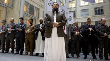 Imam Asim Hafiz, OBE the Islamic advisor to the Armed Forces leads the Prayers in the Ministry of Defense last July. (Credit:  UK Ministry of Defence) 