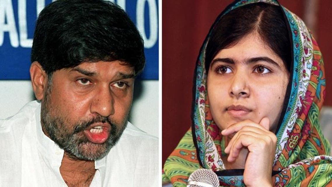 ailash Satyarthi (L), Indian anti-child labour activist and head of the South Asian Coalition Against Child Servitude, addressing a press conference in New Delhi on June 18, 1999. (AFP)