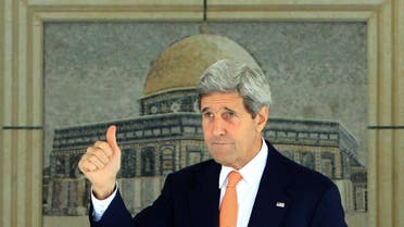US Secretary of State John Kerry gestures upon his arrival for a meeting with Palestinian leader Mahmoud Abbas in the West Bank city of Ramallah on July 23, 2014. (AFP)