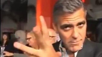 George Clooney busts a Middle Eastern dance move