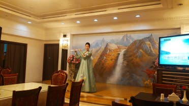 3- An Okryu-gwan flutist wearing a traditional North Korean dress. (Al Arabiya)
