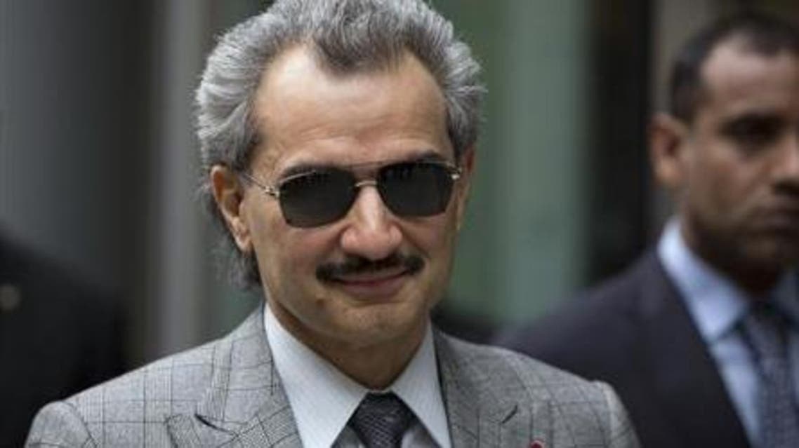 Prince Alwaleed bin Talal is seen leaving the High Court in London in this July 2, 2013 file photograph.