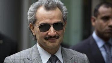 Prince Alwaleed bin Talal is seen leaving the High Court in London in this July 2, 2013 file photograph. 