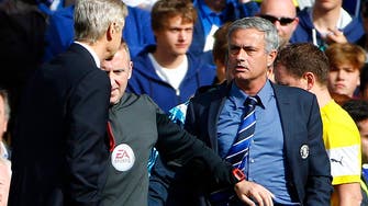 Wenger apologizes for shoving Mourinho