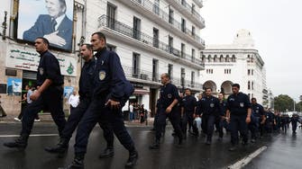Algerian police march in rare protest in capital