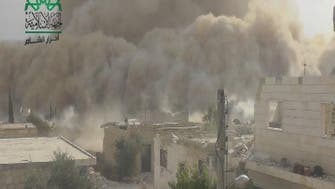Syrian rebels bomb regime barrier in Idlib