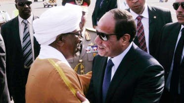  Sudanese President Omar al Bashir (L) welcomes Egyptian President Abdel Fattah al-Sisi upon his arrival at Khartoum airport for an official visit on June 27. (EBRAHIM HAMID/AFP/Getty Images) 