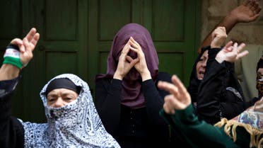 Palestinian women take part in a protest against Jewish visitors to the compound known to Muslims as Noble Sanctuary and to Jews as Temple Mount in Jerusalem's Old City October 14, 2014. (Reuters)
