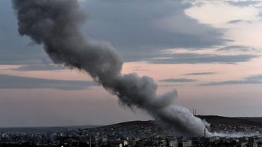 Smoke rises from an explosion in the Syrian town of Kobane, as seen from the Turkish border on October 18, 2014. (AFP)