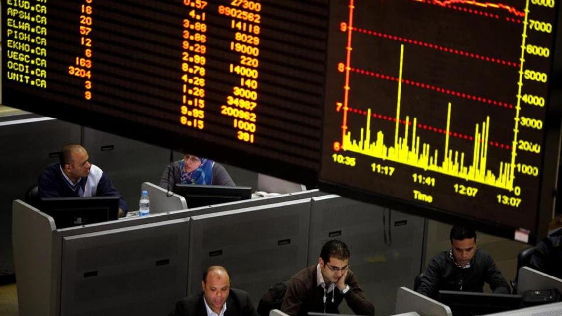 Egyptian traders work at the stock market in Cairo, Egypt. (Photo courtesy: AP)