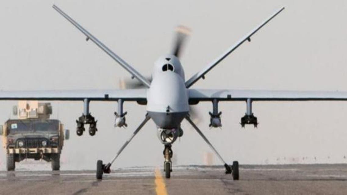 An armed unmanned Reaper drone prepares for takeoff (Reuters).