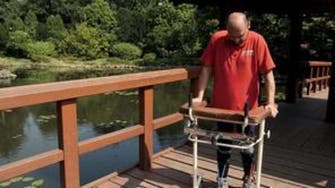 Watch paralyzed man walk again after pioneering treatment