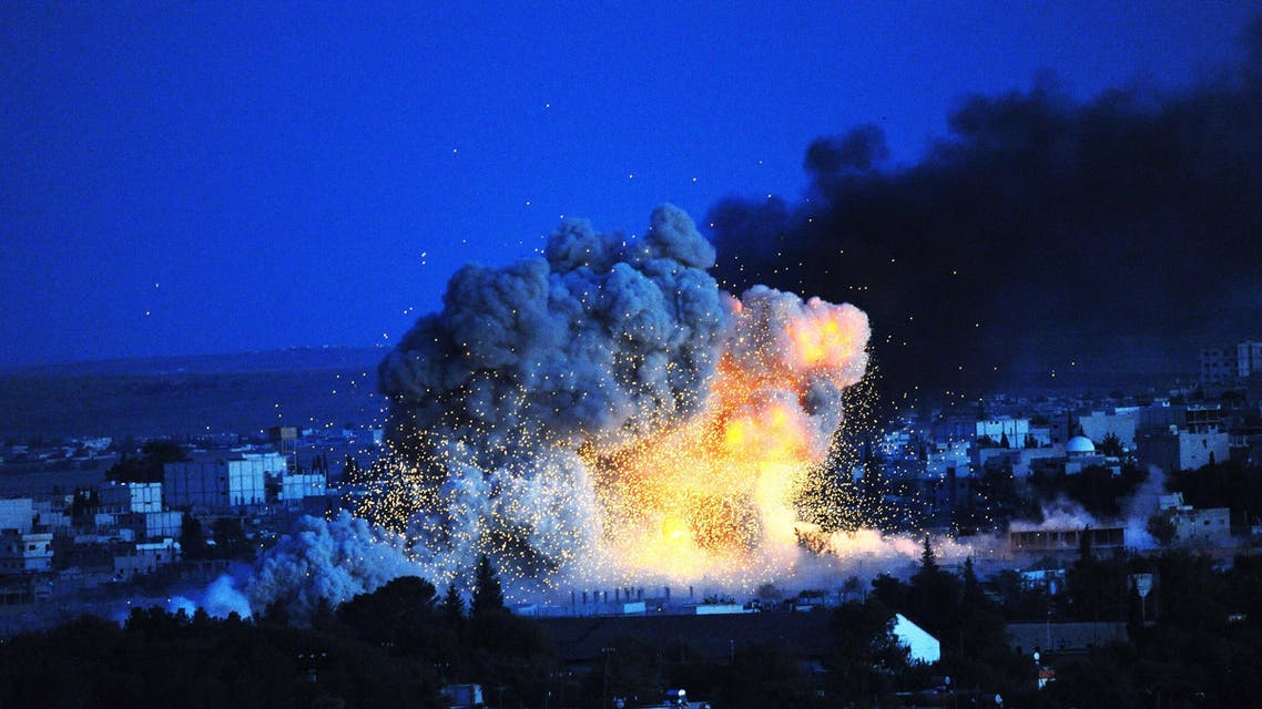 Smoke and flames rise following an explosion in the Syrian town of Kobane. (AFP)