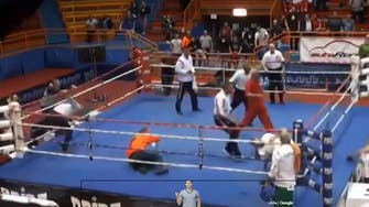 Video: Boxer bashes referee to the ground after defeat in the ring 