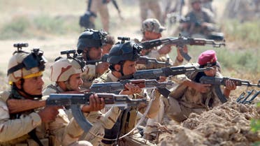 Iraqi Army personnel take part during an intensive security deployment against Islamic State militants in Jurf al-Sakhar October 27, 2014. (Reuters)