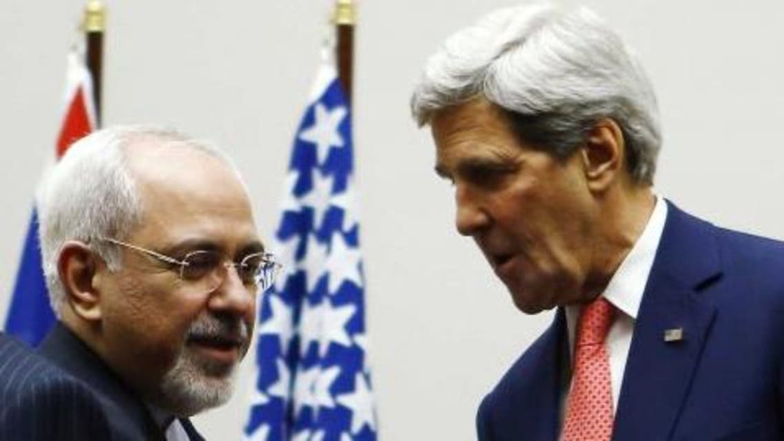 U.S. Secretary of State John Kerry (R) shakes hands with Iranian Foreign Minister Mohammad Javad Zarif after a ceremony at the United Nations in Geneva November 24, 2013. (Reuters)