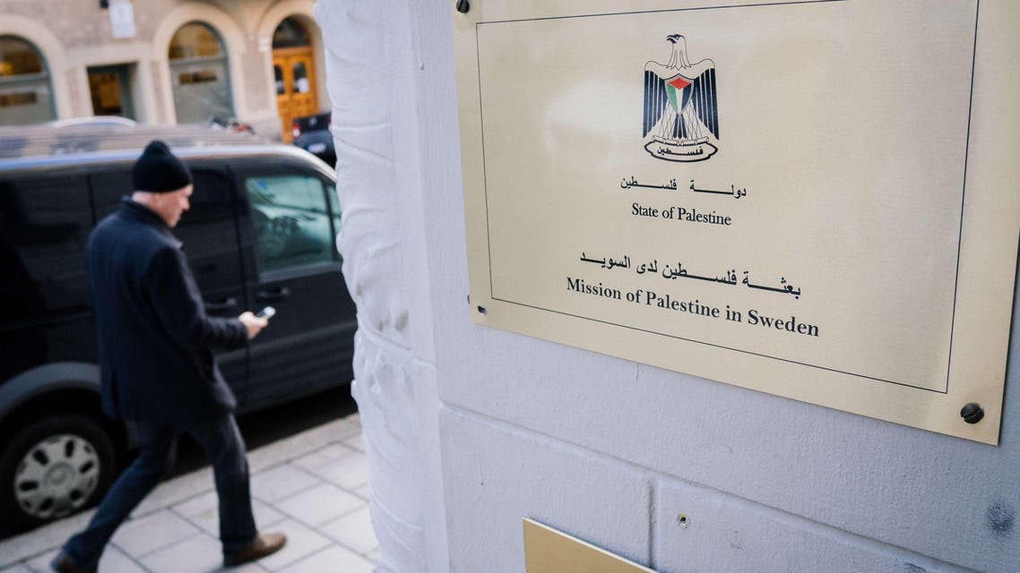 A man walks by the entrance of the Palestinian Representative Office in Stockholm, Sweden 's capital, on Oct. 30, 2014. (Reuters)