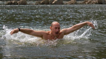 Vladimir Putin swims in a Siberian lake. (Photograph: Ria Novosti/Reuters)