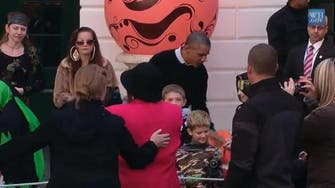 Obamas greet trick-or-treaters at the White House 