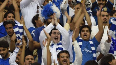 Fans of Saudi Arabia's Al Hilal cheer during a match against Australia's Western Sydney Wanderers in the AFC Champions League final football match at King Fahad stadium in Riyadh city on November 1, 2014.  (AFP)