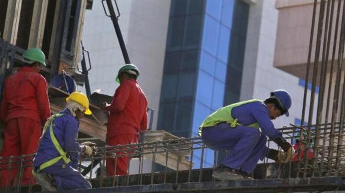 saudi workers Reuters