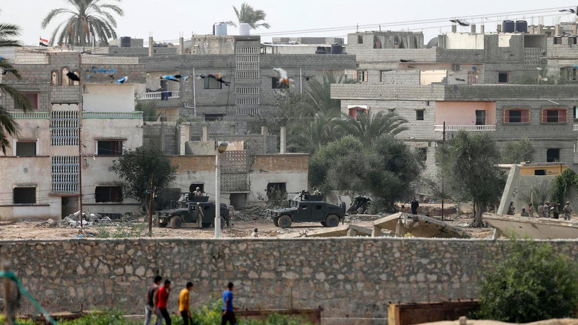 Egyptian soldiers keep guard during a military operation in the Egyptian city of Rafah, near the border with the southern Gaza Strip November 2, 2014. (Reuters)