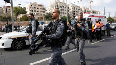 Israeli police officers walk at the scene of an attack in Jerusalem November 5, 2014. (Reuters)
