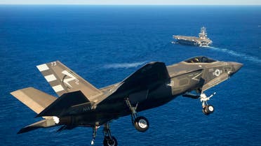 An F-35C Lightning II carrier variant joint strike fighter approaches the USS Nimitz to conduct an arrested landing in the Pacific Ocean, Nov. 3, 2014.  (U.S. Navy photo courtesy of Lockheed Martin by Andy Wolfe)