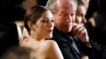 Actress Marion Cotillard and director Luc Dardenne of the film "Two Days, One Night" attend the Academy of Motion Picture Arts and Sciences Governors Awards in Los Angeles, California November 8, 2014. (Reuters)