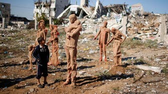 Stuck in the rubble: Gaza artist deploys frozen human figures