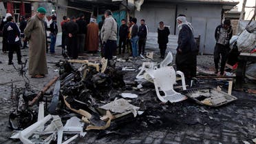 People gather at the site of a car bomb attack in Baghdad's Sadr City, November 9, 2014. (File photo: Reuters)