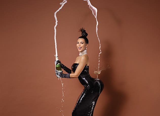 Kim Kardashian and Kanye West strike a major pose at star-studded Versace  show - Mirror Online