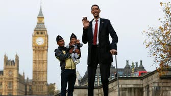 The world's tallest and shortest men meet for Records Day 