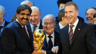 Qatar says it will go forward with plans to host World Cup