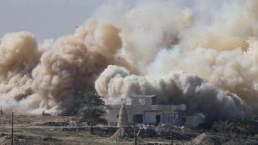 Smoke rises as a house is blown up during a military operation by Egyptian security forces in the Egyptian city of Rafah, near the border with southern Gaza Strip November 6, 2014. REUTERS/Ibraheem Abu Mustafa