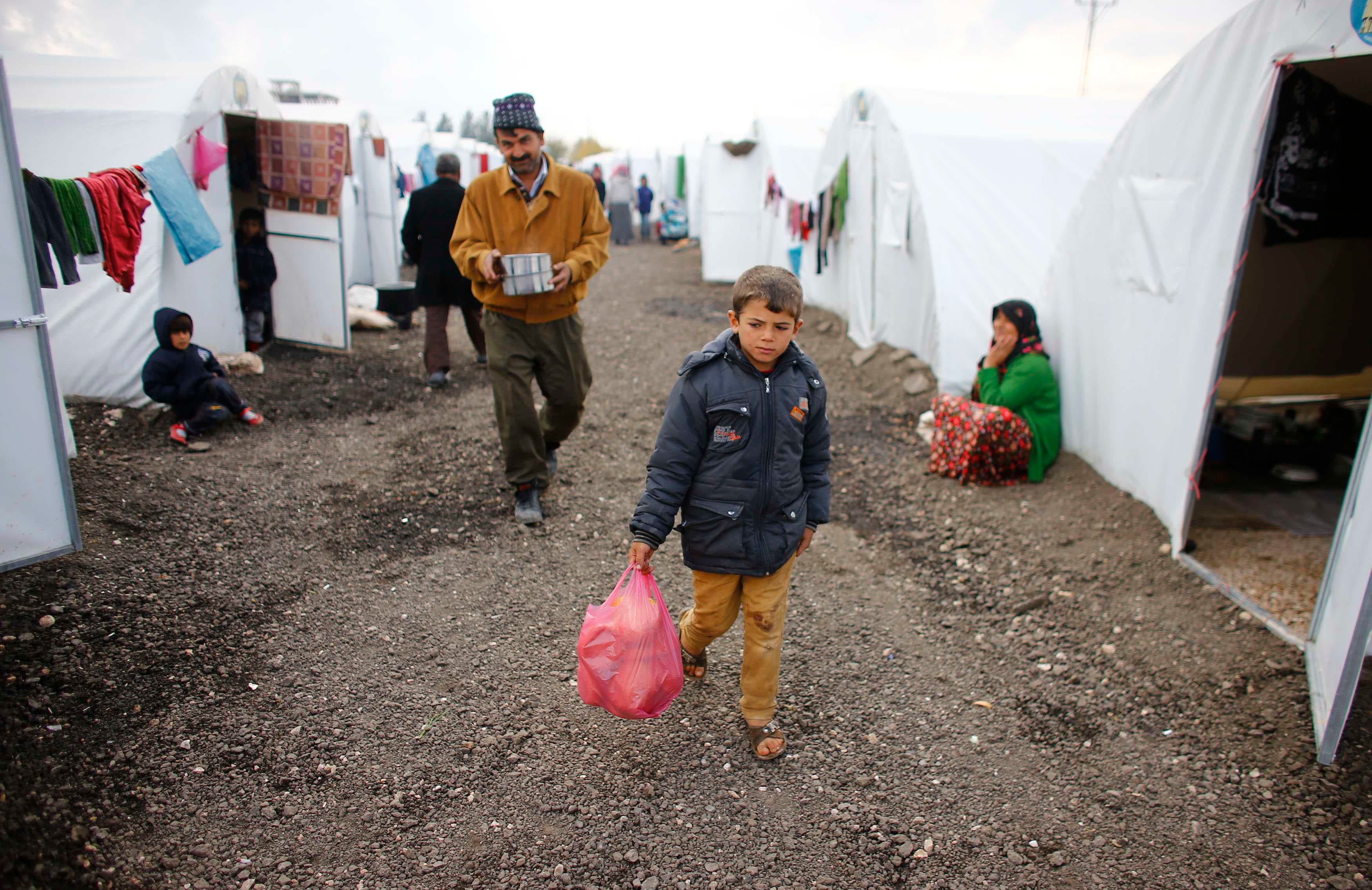 Kurdish refugees from the Syrian town of Kobani