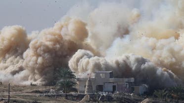 Smoke rises as a house is blown up during a military operation by Egyptian security forces in the Egyptian city of Rafah, near the border with southern Gaza Strip November 6, 2014.  