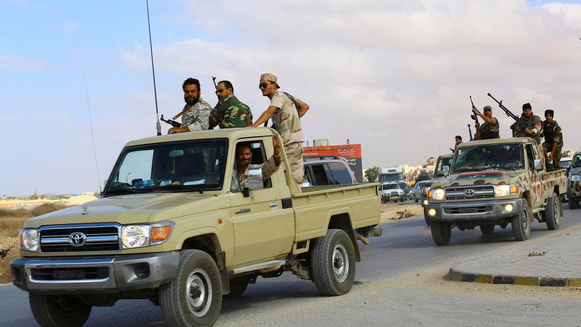 Forces loyal to former general Khalifa Haftar ride in vehicles in Benghazi November 20, 2014. (Reuters)