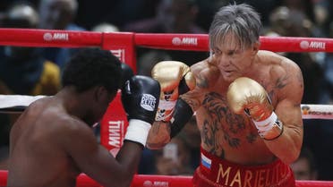 Mickey Rourke and his opponent during the match. (Photo courtesy: AP)