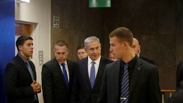 Israel's Prime Minister Benjamin Netanyahu (C) arrives to the weekly cabinet meeting in Jerusalem November 30, 2014. (Reuters)
